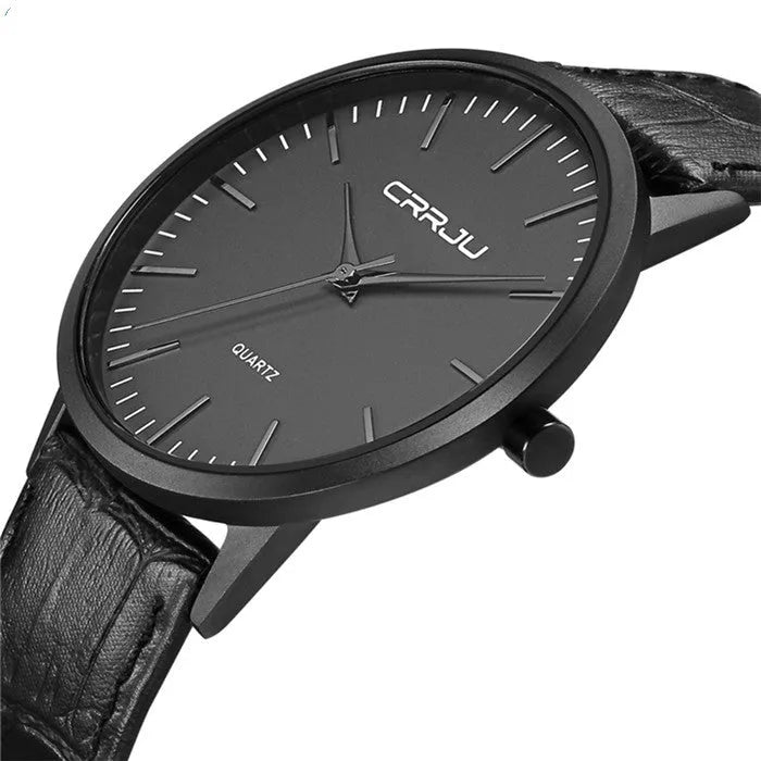 Quartz watch with alloy case and mesh strap showing black face with gold hands