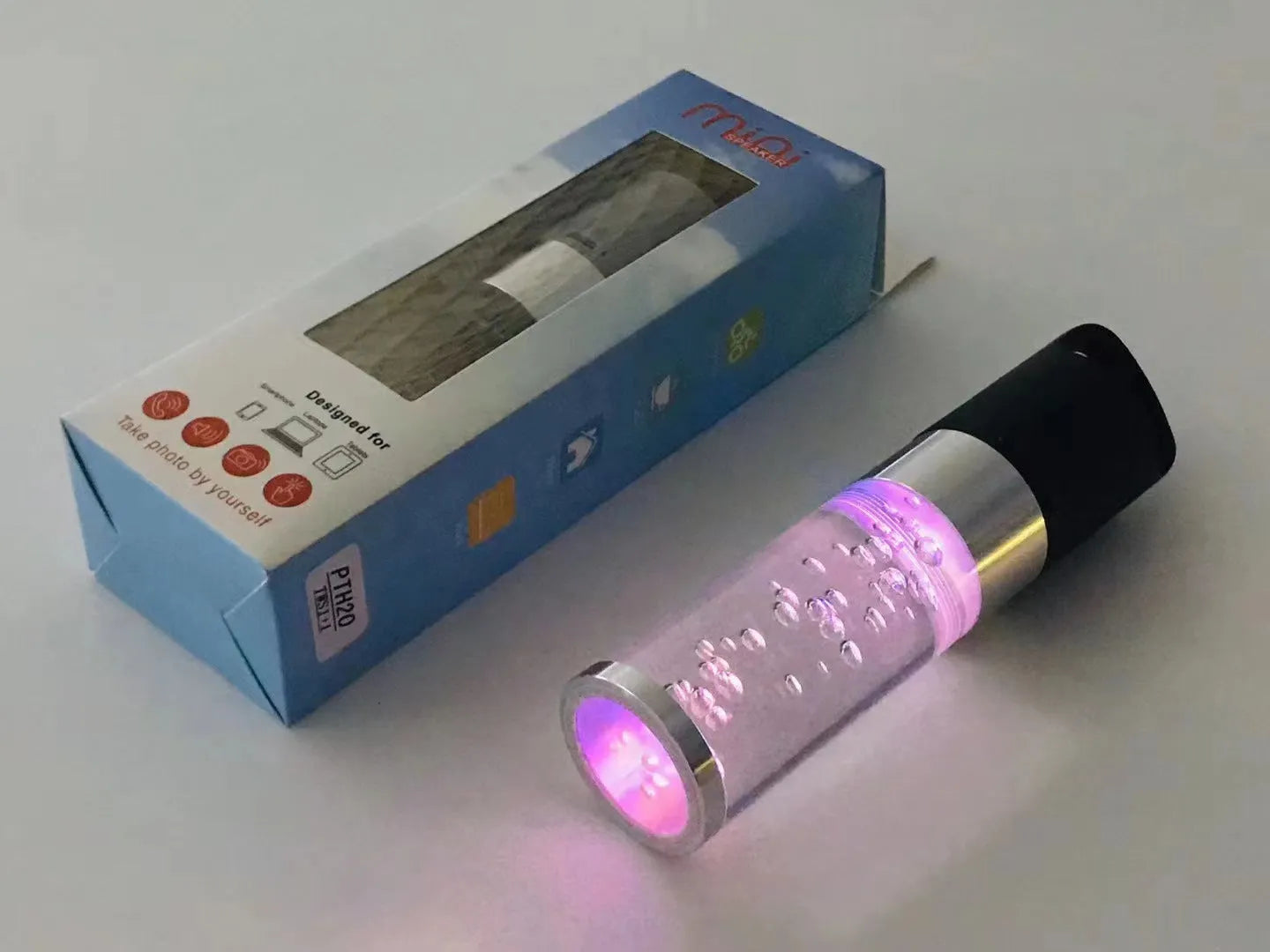 Portable Bluetooth speaker with colourful crystal lighting effects in compact design