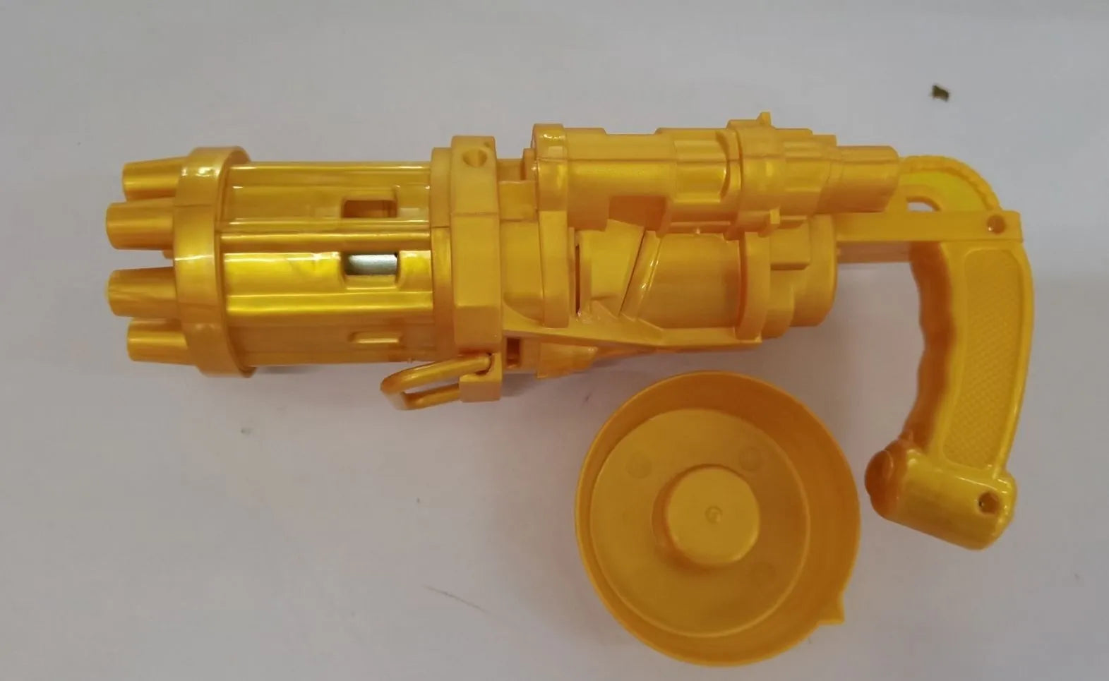 Kids bubble machine gun toy in pink, gold, or black colours with trigger and removable bubblehead.