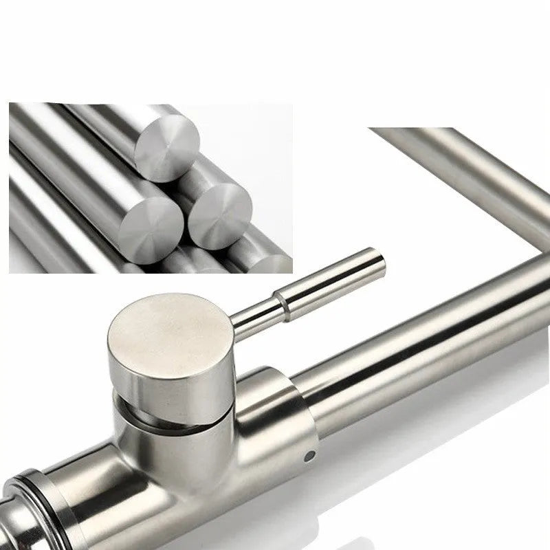 Silver stainless steel kitchen mixer tap with dual handles and rotating spout