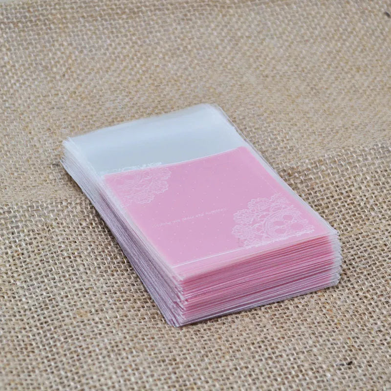 Pink self-adhesive plastic packaging bags with UV printing, 7x7cm size