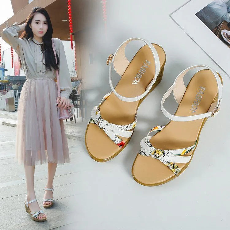 Women's pink wedge sandals with a fish mouth opening and buckle strap on a non-slip PU sole.