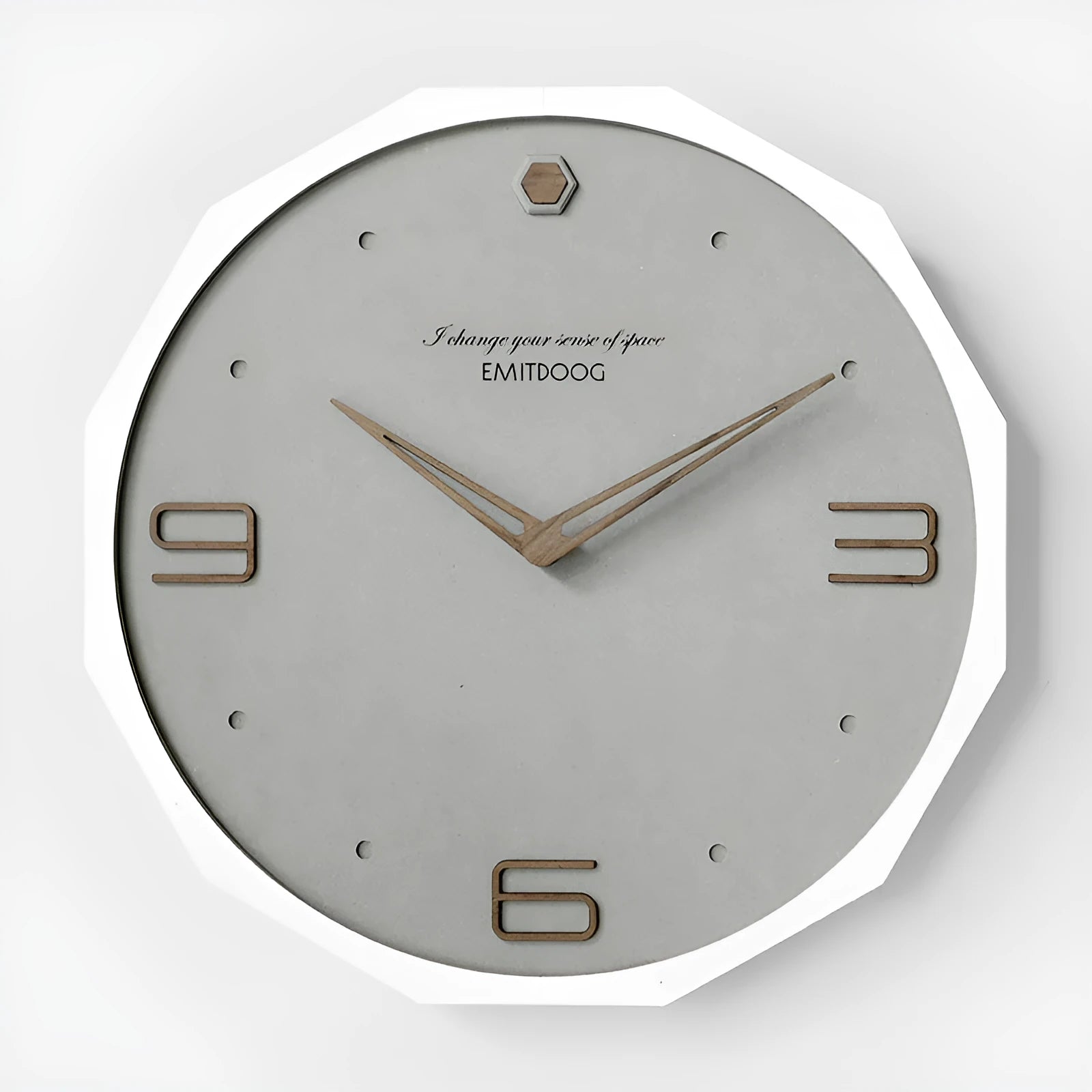 Round 12 inch Nordic minimalist wall clock with wooden frame on a light-coloured wall.