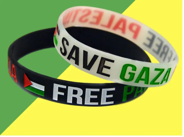 Palestine flag silicone wristband set with geometric design, including black and white plain bands
