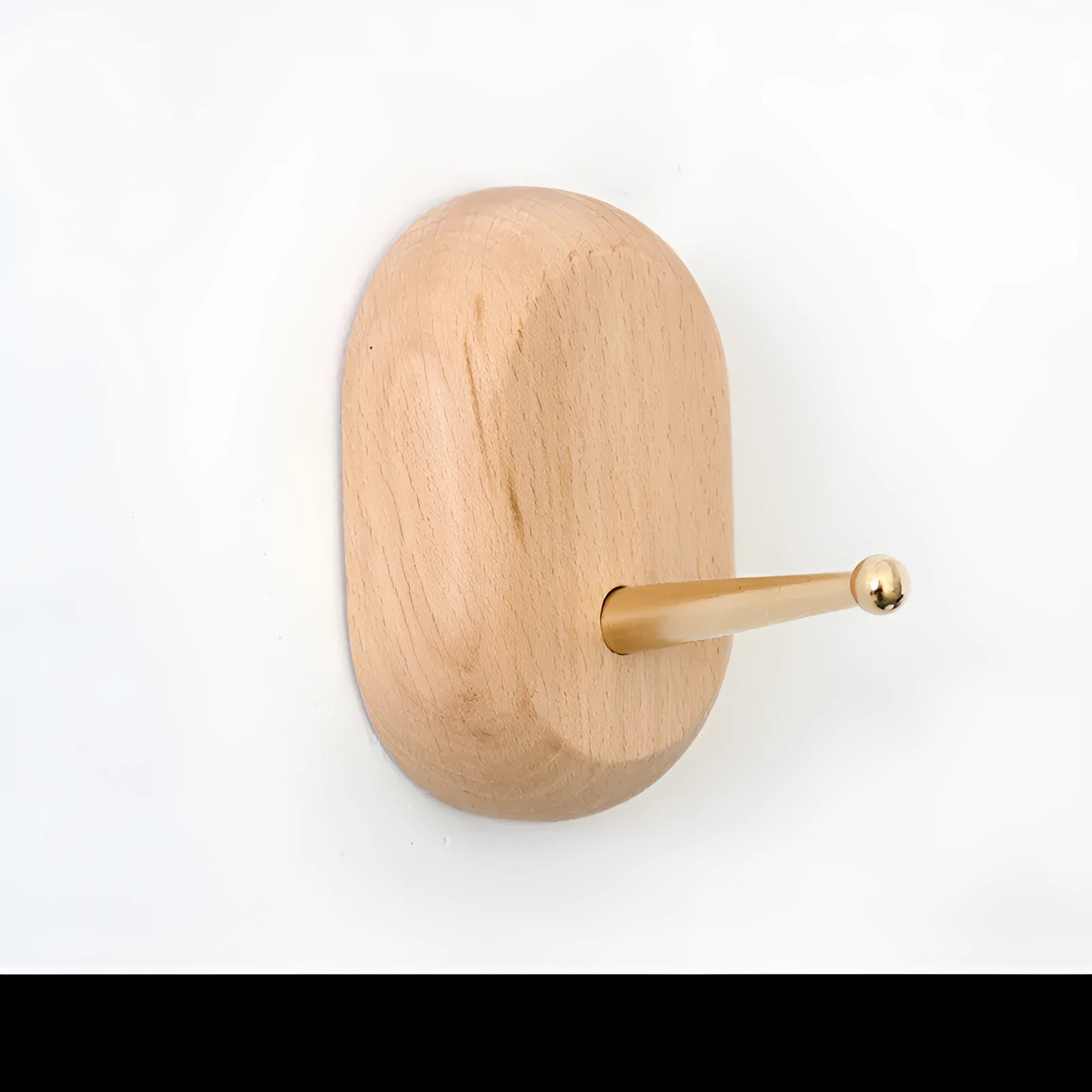 Beech wood adhesive wall hook with brass finish in capsule shape, shown next to round, oval, diamond and square variants.