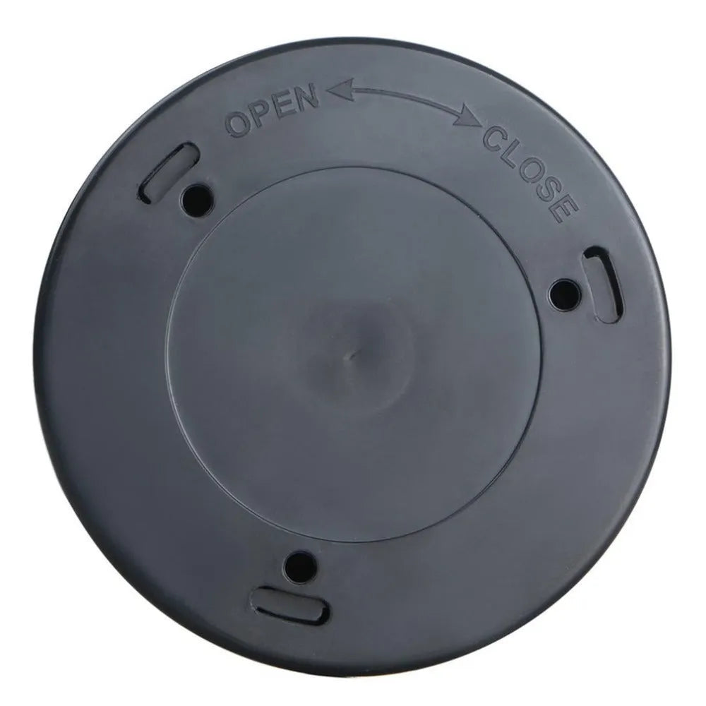 Silver wireless motion sensor night light on a table, showing its compact 80mm size.