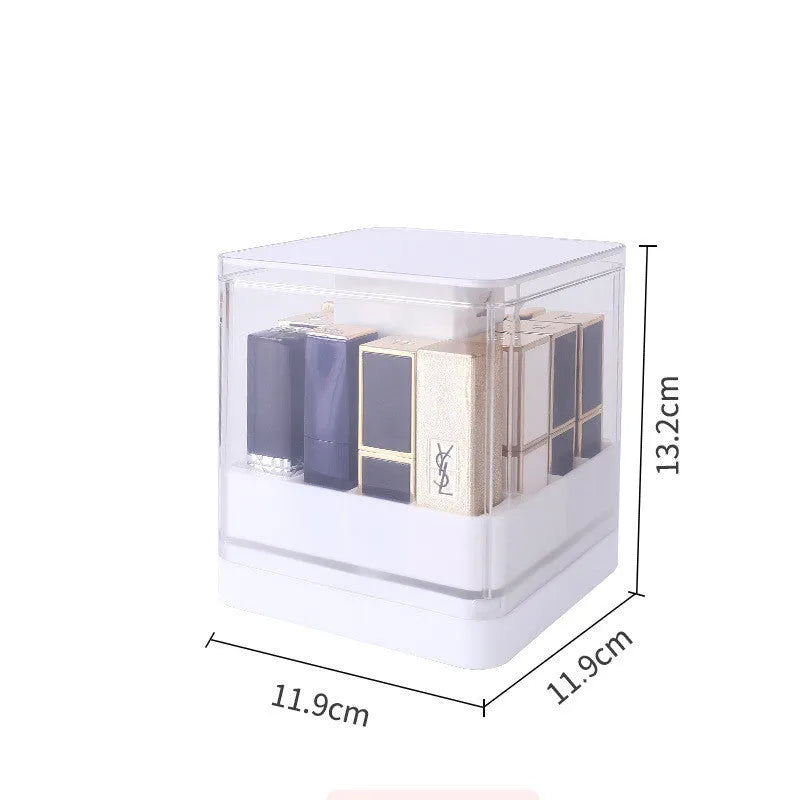 White press lift lipstick storage box with dust-proof lid open on a desktop