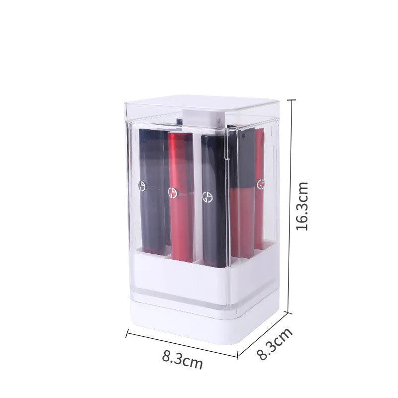 White press lift lipstick storage box with dust-proof lid open on a desktop
