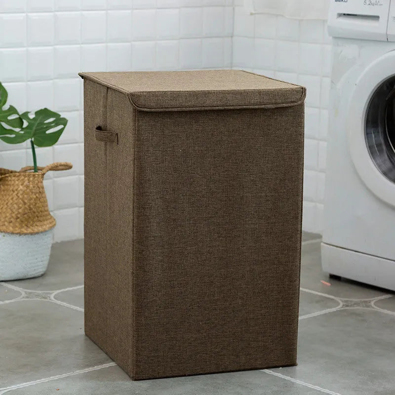 Washable fabric laundry sorting box in beige, showing cotton linen material and covered design for bathroom storage.