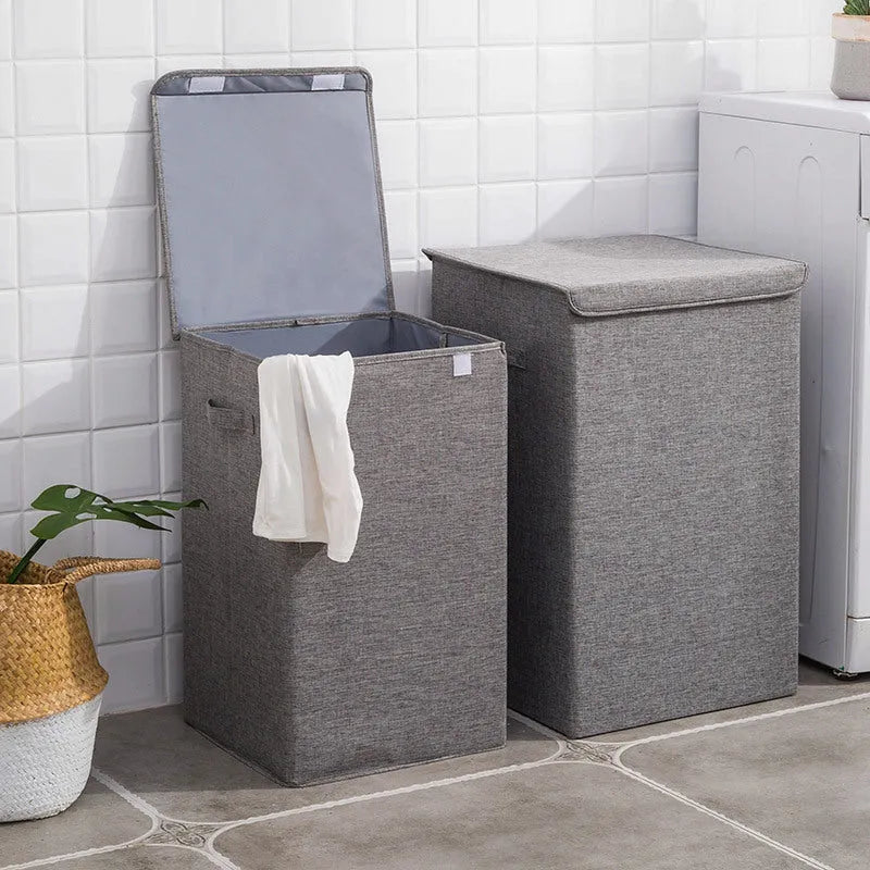 Washable fabric laundry sorting box in beige, showing cotton linen material and covered design for bathroom storage.