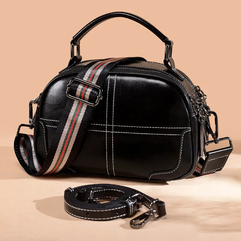 Round leather handbag with zipper and double soft handles in multiple colour options