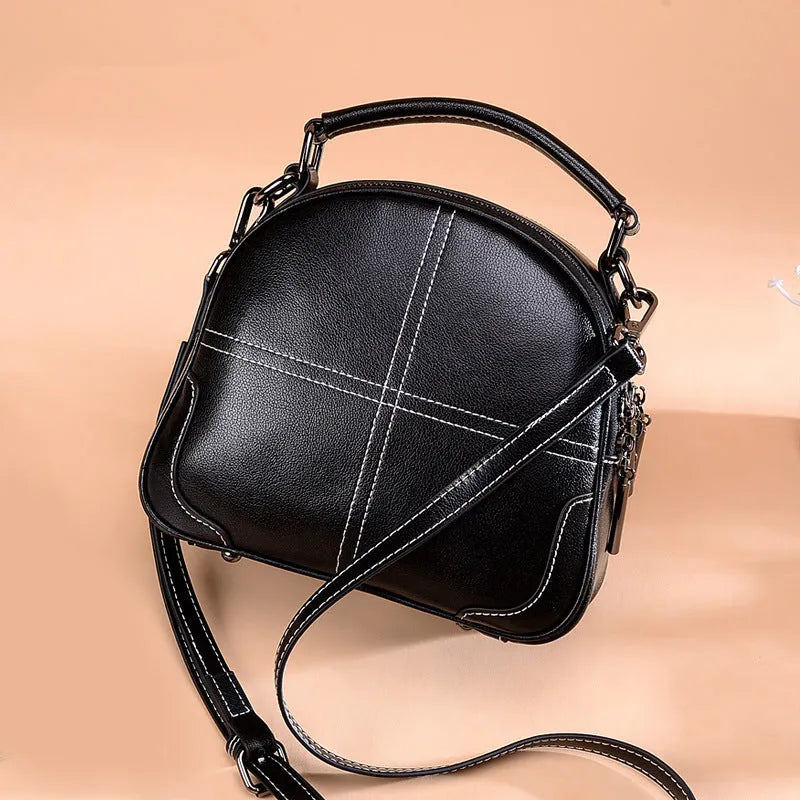 Round leather handbag with zipper and double soft handles in multiple colour options