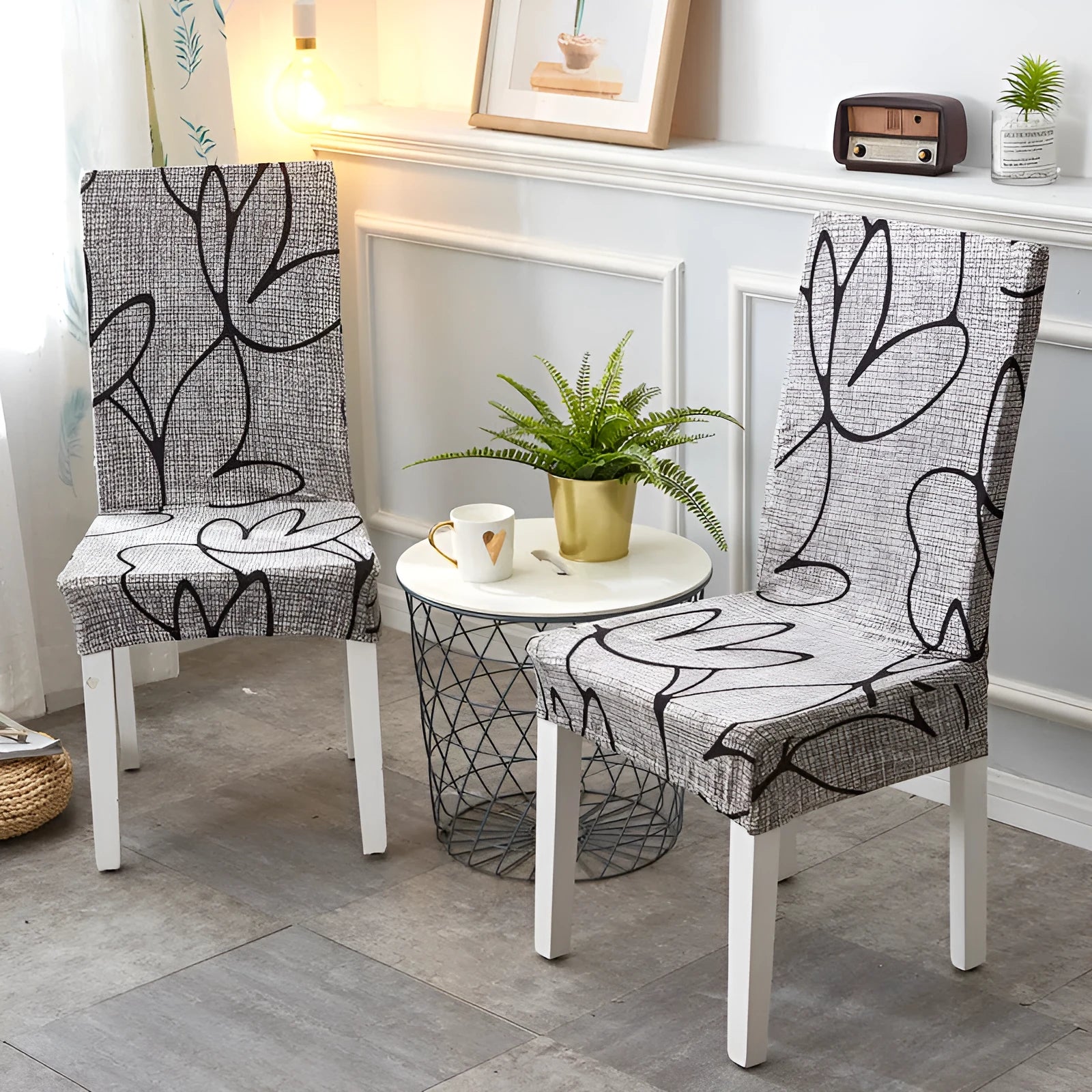 A stretchy spandex chair cover fitted neatly on a four-legged wooden dining chair.