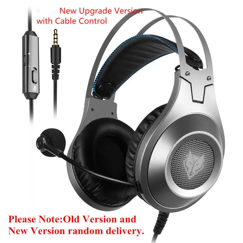 Black wired USB computer headset with over-ear cups and an integrated microphone on a PC desk.