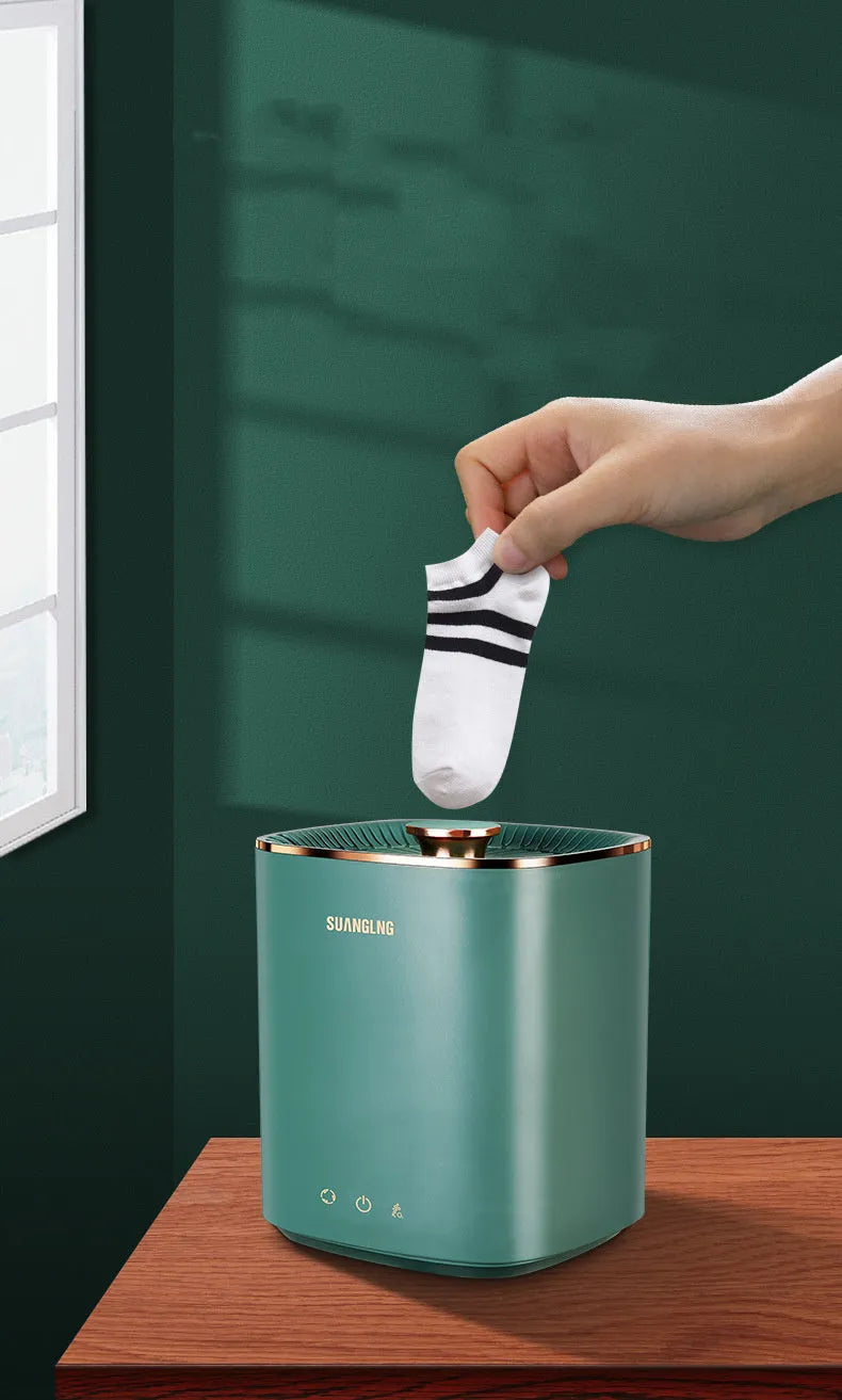Green mini portable washing machine for underwear with ozone sterilisation and 300mL capacity.