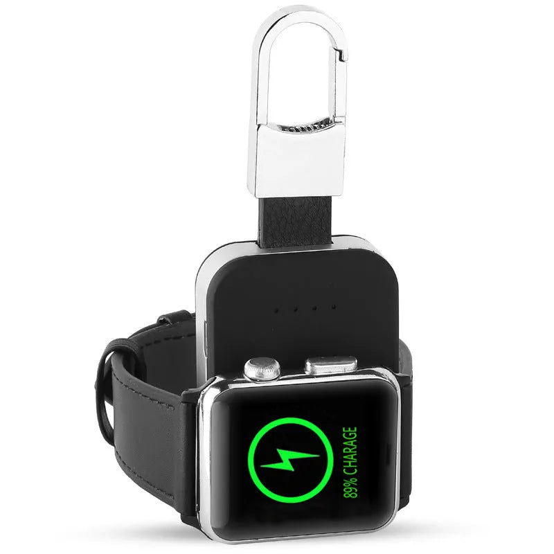 Black Apple Watch keychain wireless power bank with 1000mAh battery next to an Apple Watch.