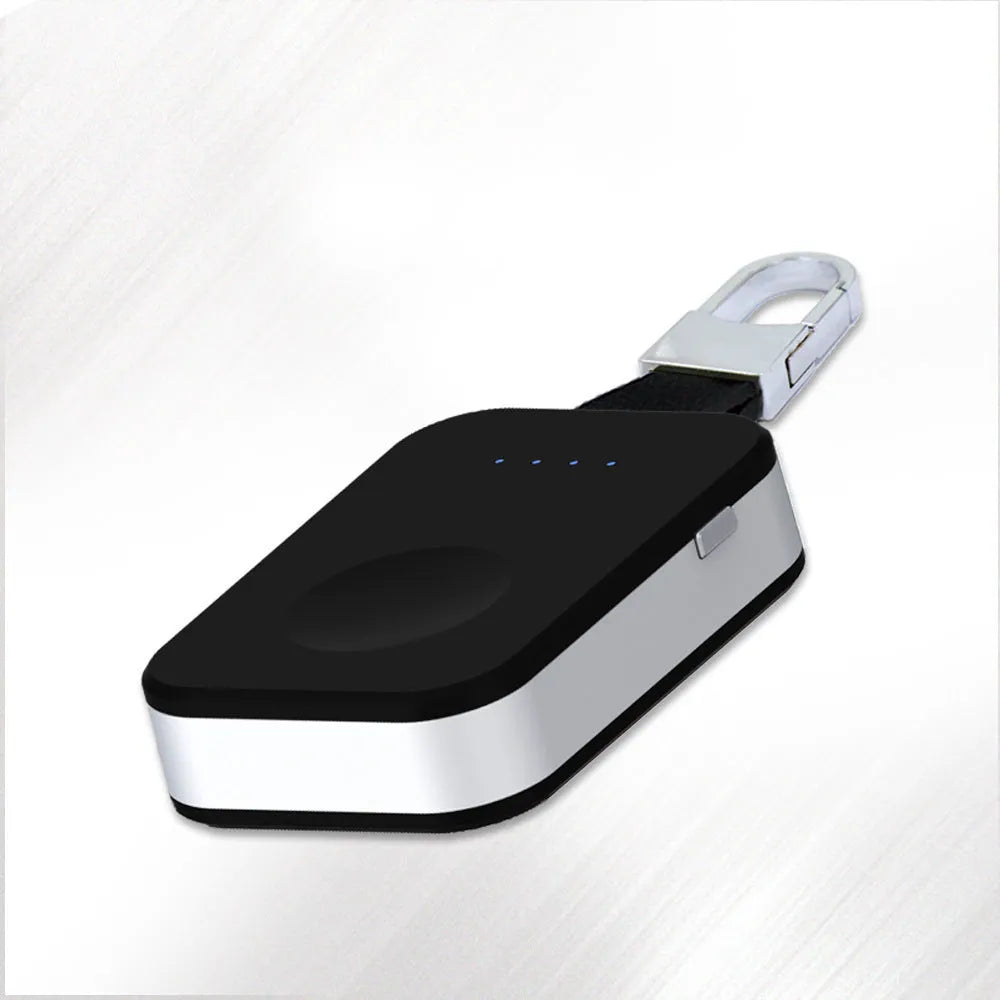 Black Apple Watch keychain wireless power bank with 1000mAh battery next to an Apple Watch.