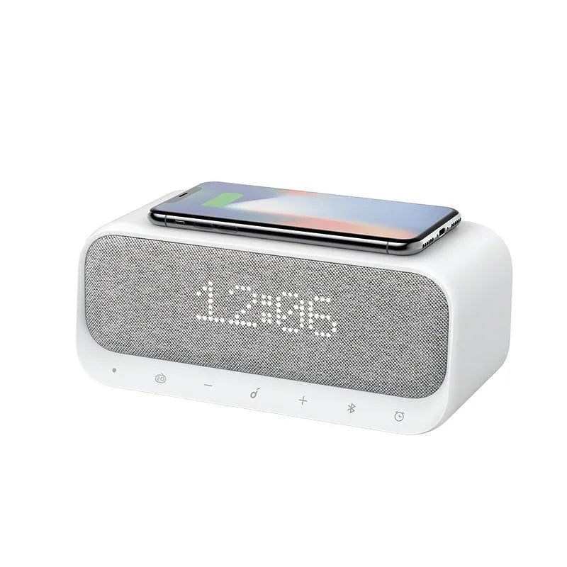 Anker Soundcore white Bluetooth speaker alarm clock with wireless charging pad on top