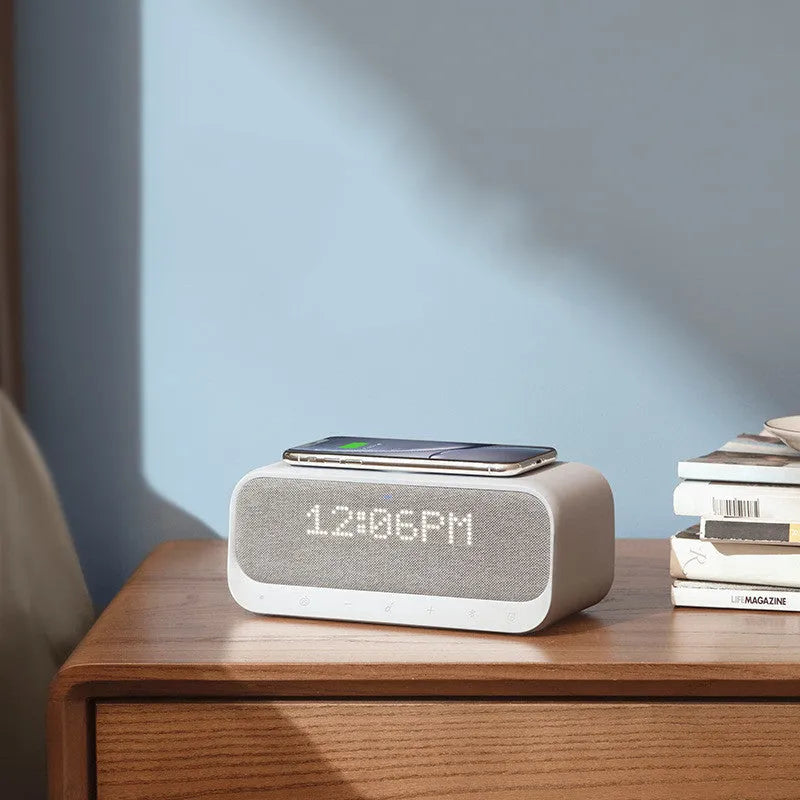 Anker Soundcore white Bluetooth speaker alarm clock with wireless charging pad on top