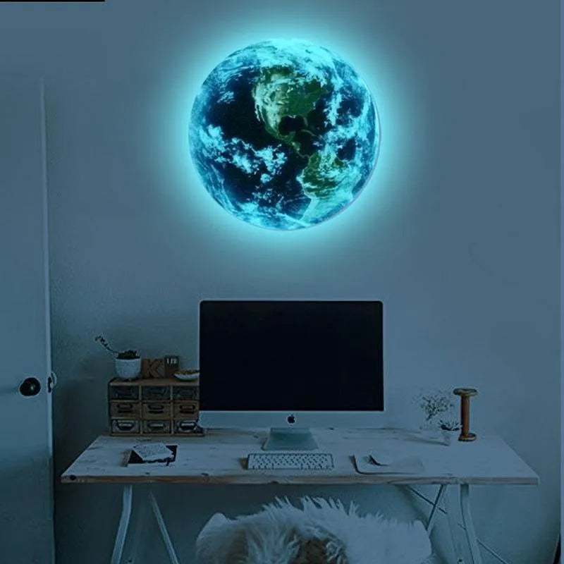 Glow in the dark 3D Earth planet wall sticker in luminous PVC material on a dark background.