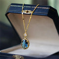 Gold geometric copper pendant on a French retro unisex necklace.