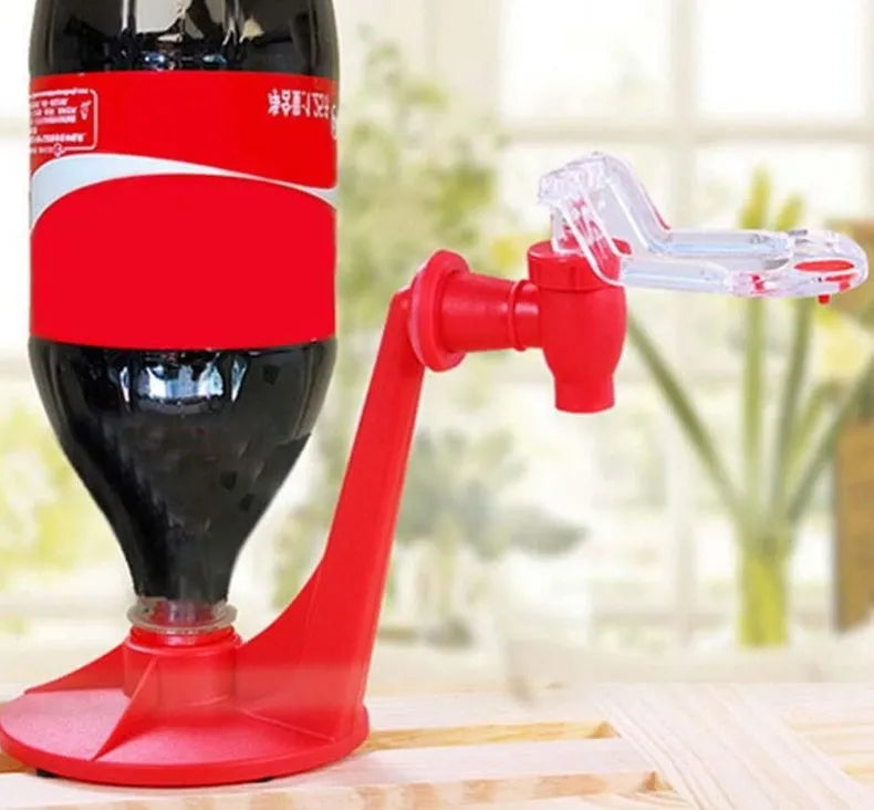 Red plastic Magic Tap soda dispenser accessory for 2-litre bottles