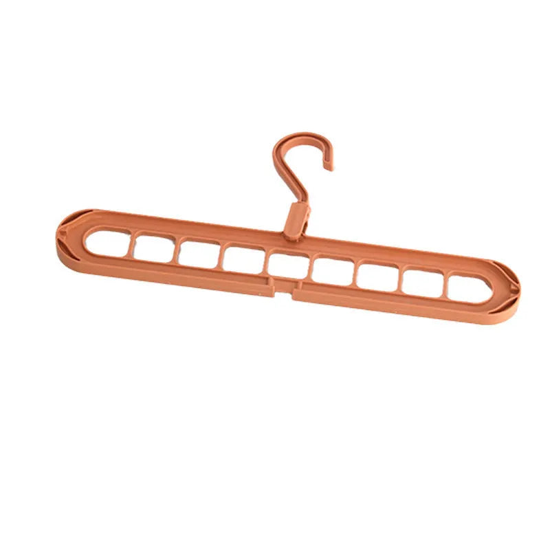 A plastic nine-hole seamless folding hanger for trousers, shown in one of five available colours.
