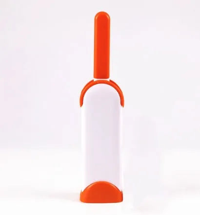 Blue reusable pet hair removal comb with a double-sided sticky brush and self-cleaning base.