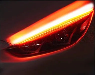 Car LED daytime running light strip with flowing turn signal function in silicone waterproof housing