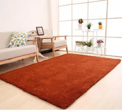 White plush rectangular area rug with a dotted non-slip bottom, shown at 40cm x 40cm size.