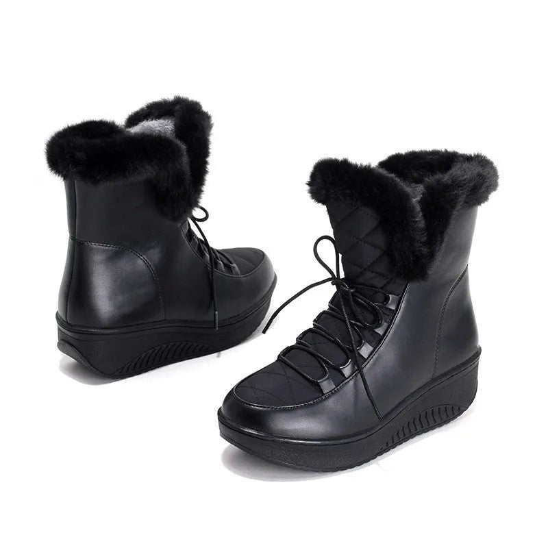 Women's black winter platform boots with lace-up closure and plush lining