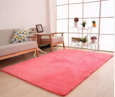 White plush rectangular area rug with a dotted non-slip bottom, shown at 40cm x 40cm size.