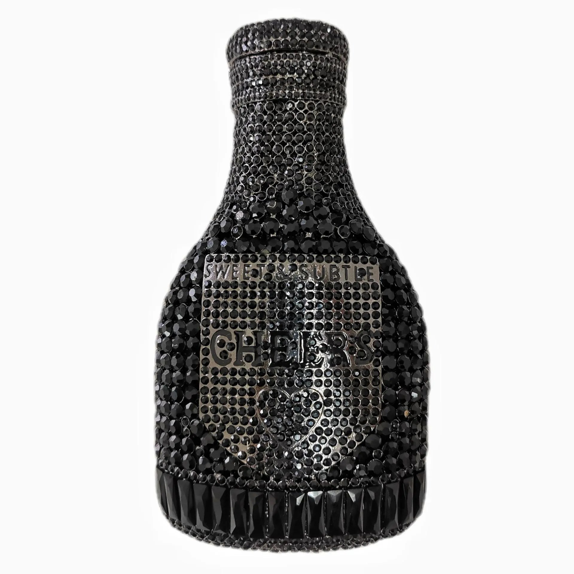 Gold rhinestone champagne bottle shaped evening clutch bag with wrist strap on a dark background.