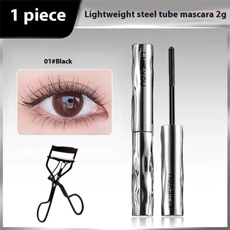 Waterproof steel tube mascara in black and brown shades shown with an eyelash curler.