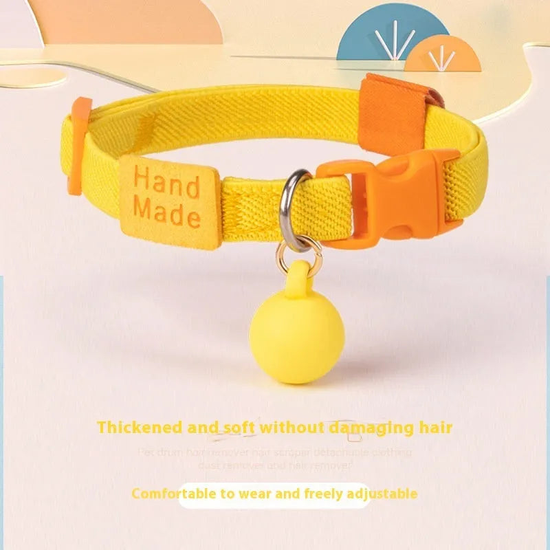 Small high elasticity polyester dog collar shown in one of seven solid colours, adjusted for a 22-32cm neck.