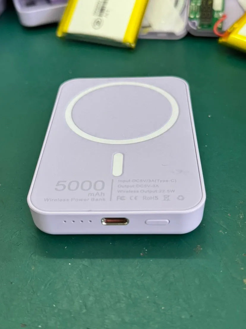 Magnetic wireless charger power bank in white with 5000mAh capacity measuring 100x65x16mm