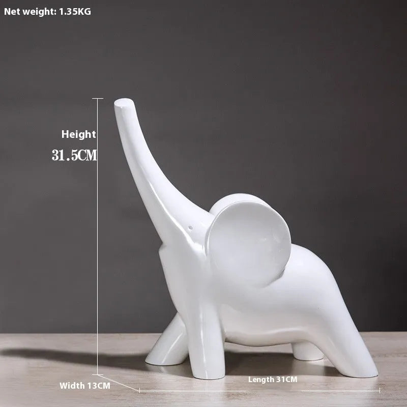 Modern resin elephant ornament in rose gold or white finish, available in large and small sizes