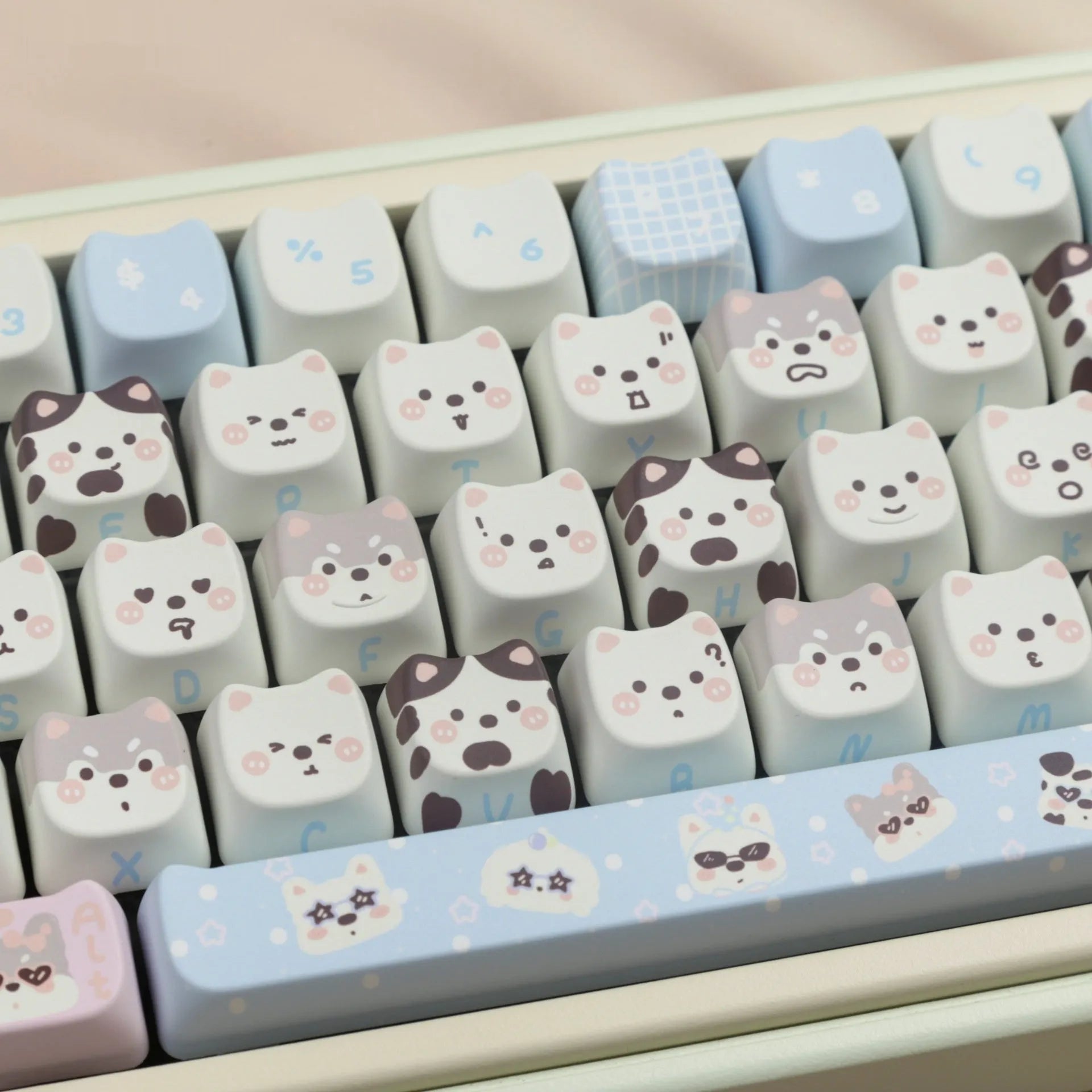 PBT sublimation key cap set showing colourful cat and puppy character designs on mechanical keyboard keys