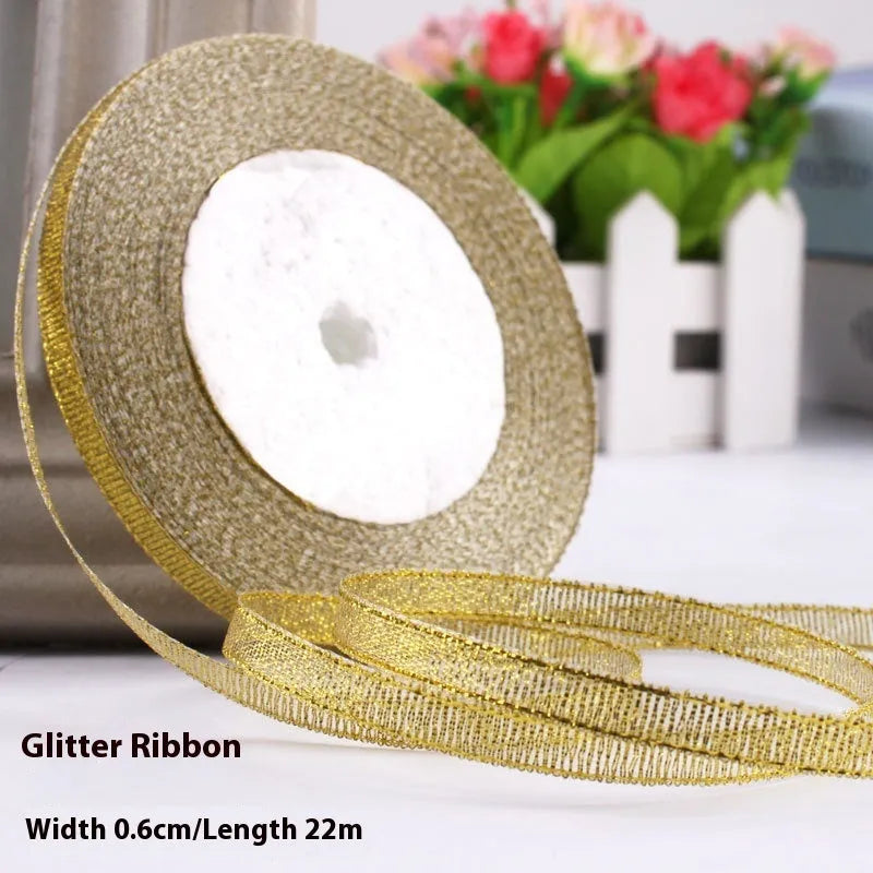 Roll of narrow 0.6cm wide polyester gift wrapping ribbon in assorted colours, showing 22 metre length.