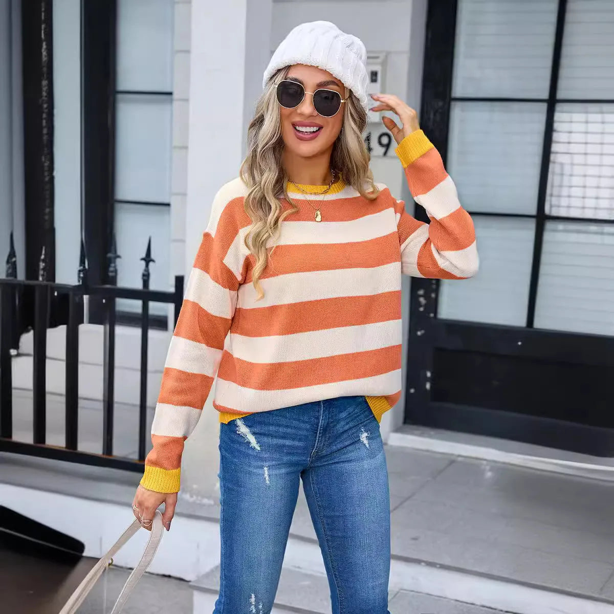 Women's loose fit acrylic sweater in multiple colours with round neck and long sleeves