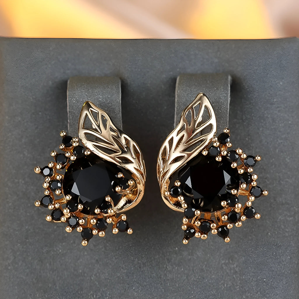 Round floral earrings with feather detailing and coloured zircon stones in champagne gold finish