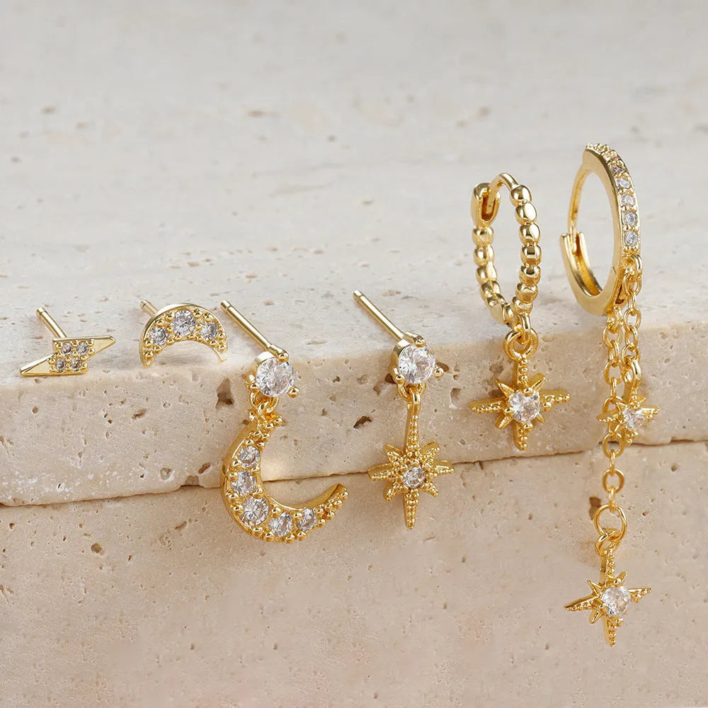 Six gold electroplated chain tassel earrings with zircon studs on copper base