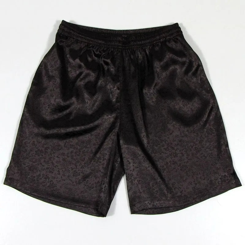 Men's black Tang suit style shorts with a loose fit and elasticated drawstring waistband.