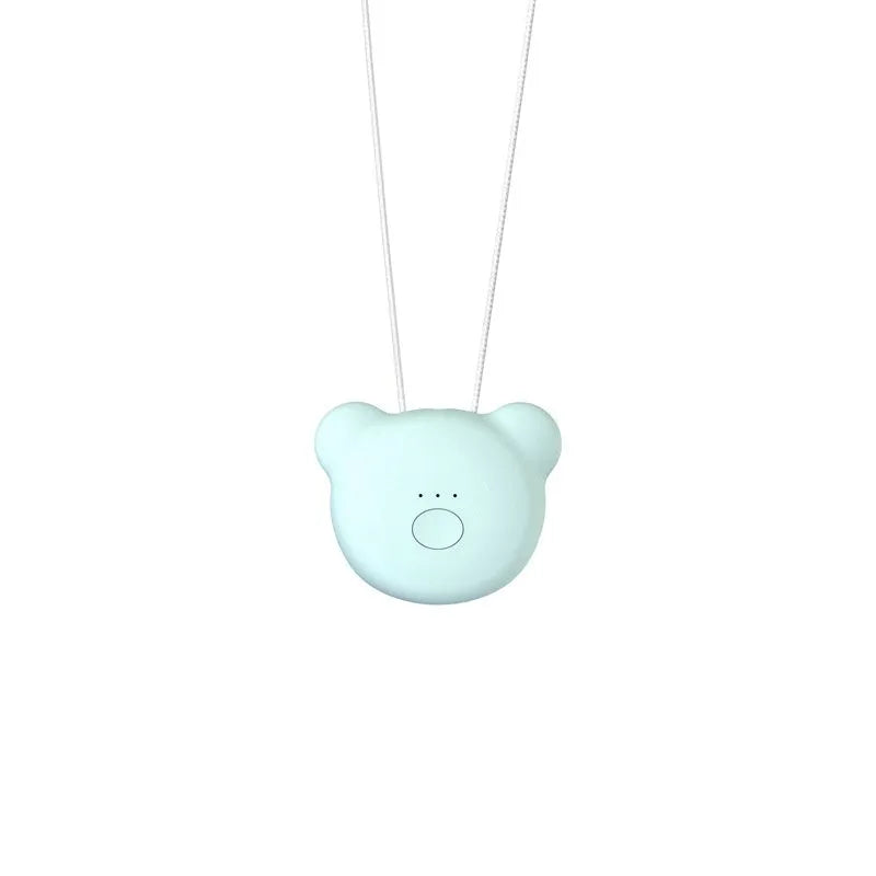 Mini USB portable air purifier necklace in pink, showing compact design with a wearable collar.
