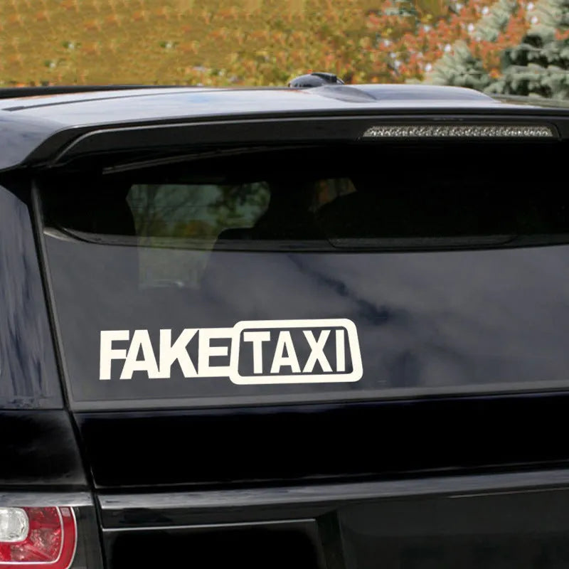 FAKE TAXI waterproof car warning sticker in black, measuring 20cm by 8cm.