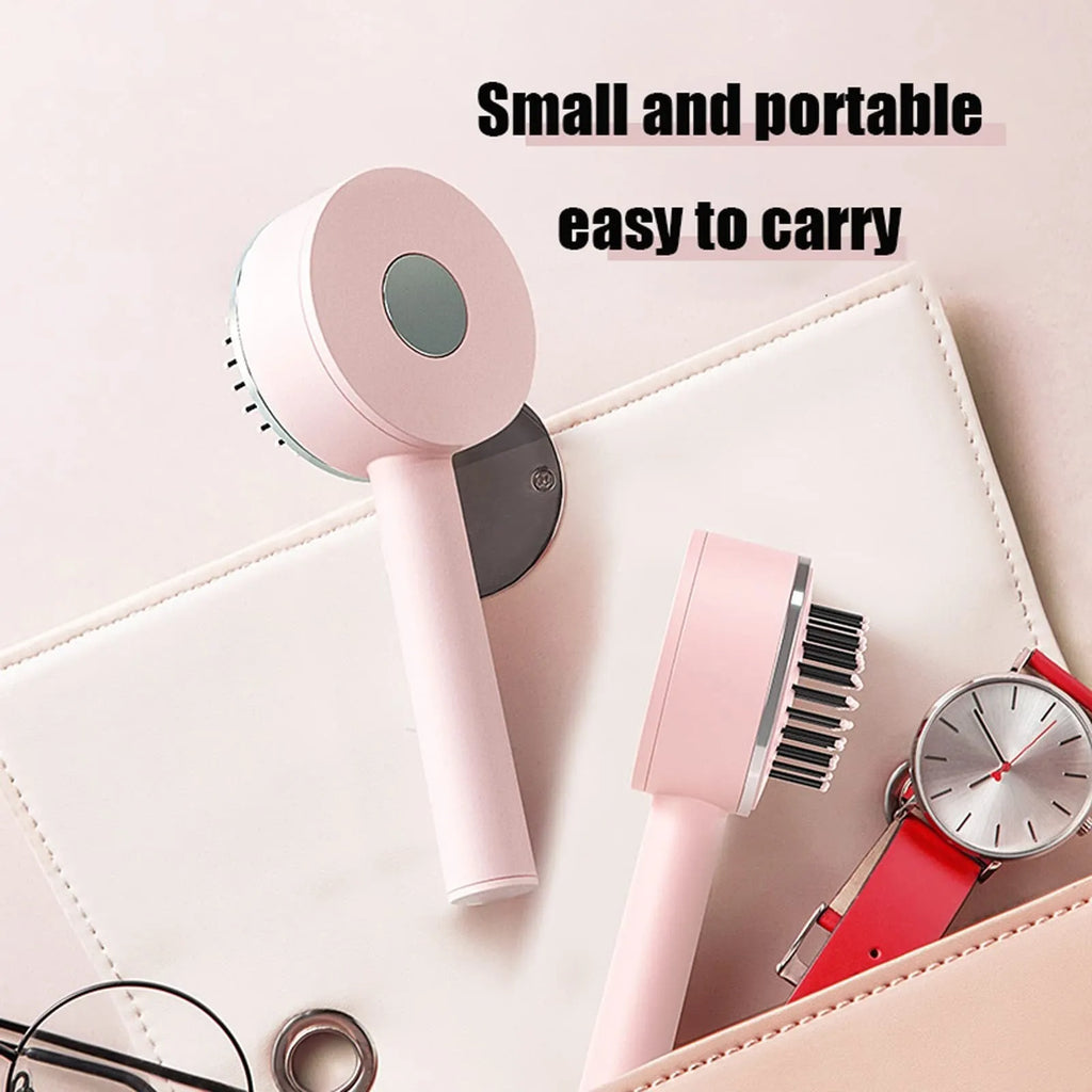 One-key self-cleaning hair brush with green airbag massage comb and non-slip handle on white background
