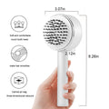 One-key self-cleaning hair brush with green airbag massage comb and non-slip handle on white background