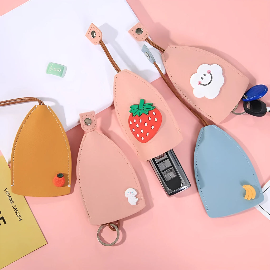 Cartoon design pull-out car key case made from soft PU leather, showing approximate size.
