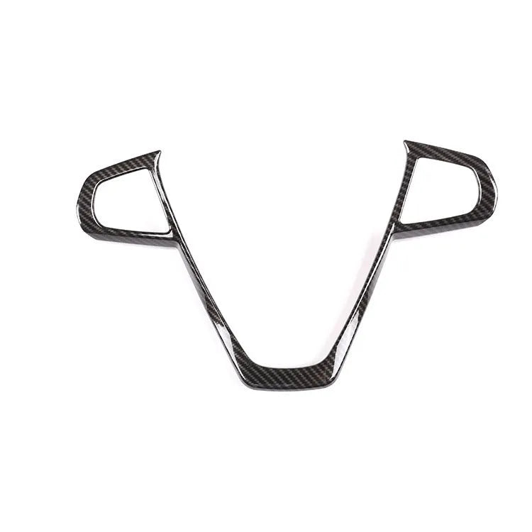 Black carbon fibre pattern button frame decoration for a BMW steering wheel.