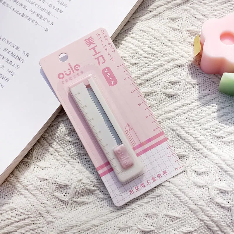 Small art knife with plastic blade in blue, pink, purple, khaki, or orange for package and paper cutting
